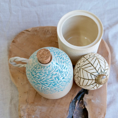 Ceramic jars with leaf pattern and coastal design