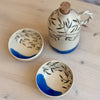 oil bottle set with two serving bowls